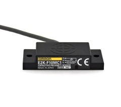 E2K-F10MB1  E2KF10MB1 OMRON 50X10,1X20MM 12-24VDC BESLEMELİ PNP NO 10MM ALGILAMALI KAPASİTİF SENSÖR